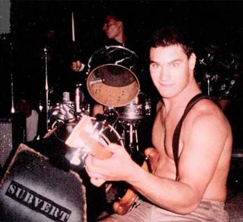  as noted before, scotty & dan would switch instruments, here is proof of that as a shirtless dan poses while scott keeps the beat going